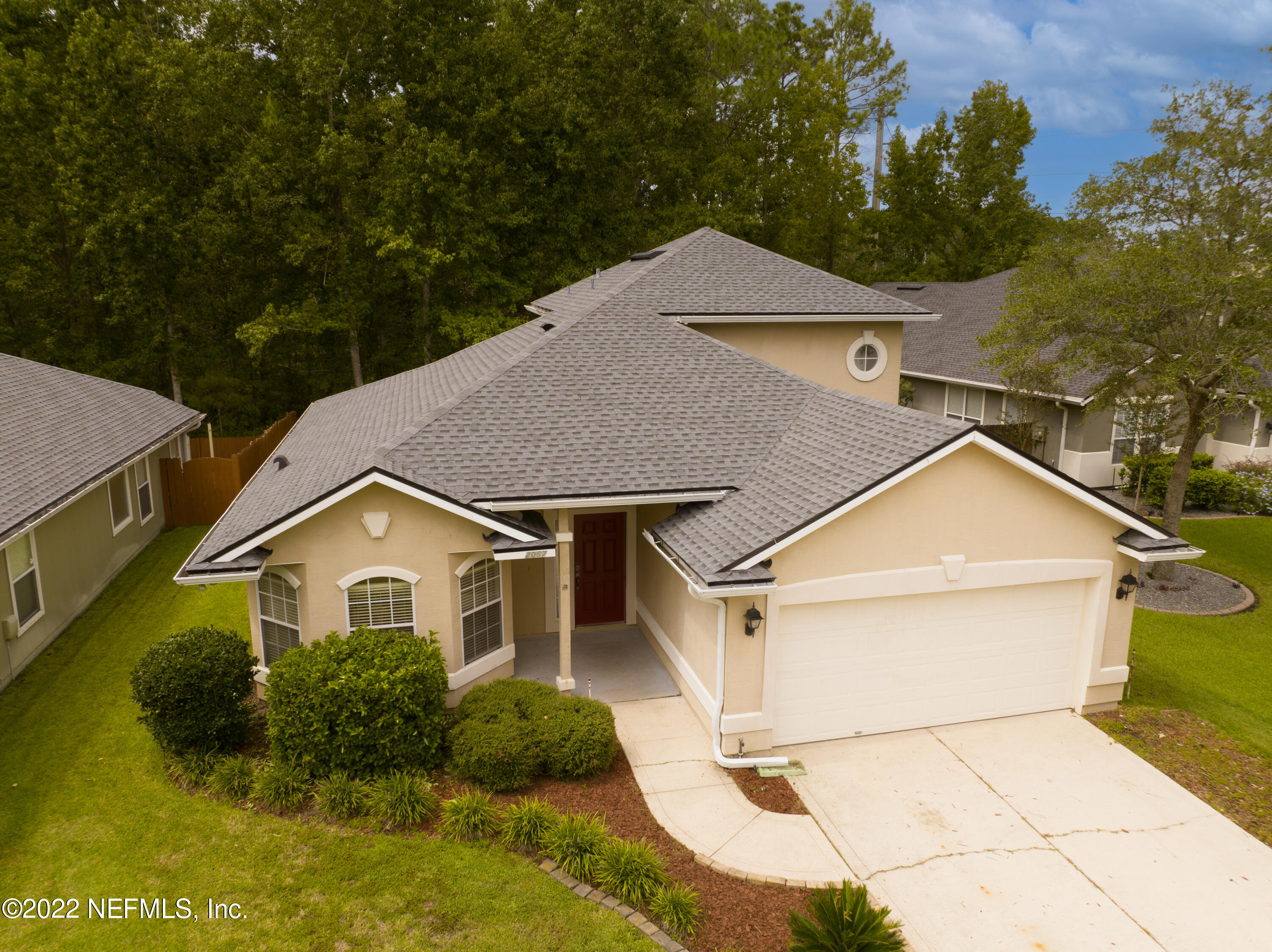 2067 North Cranbrook Avenue St. Augustine, FL 32092 - Photo 26 of 26 a view of front of house with a yard