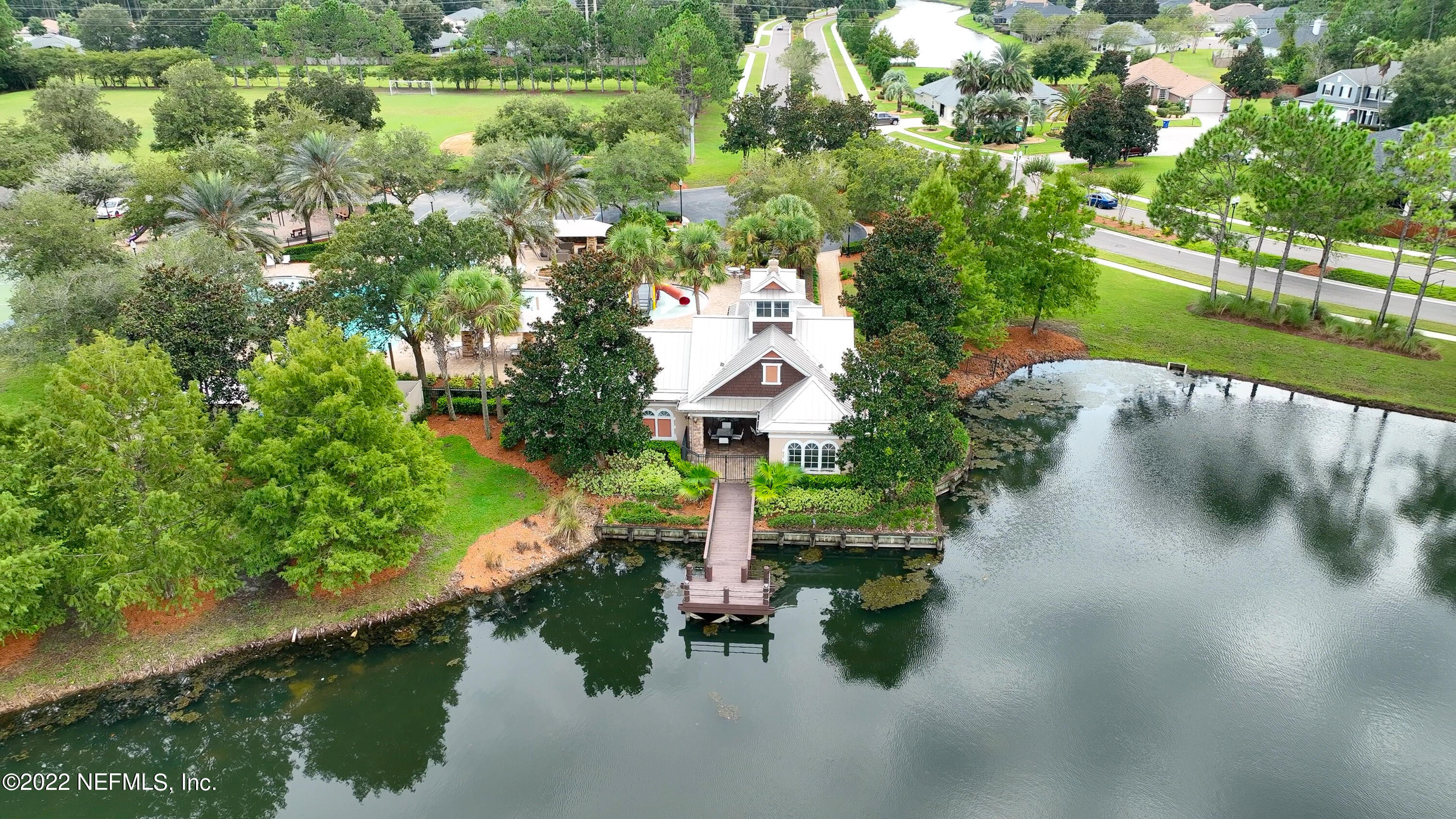 2067 North Cranbrook Avenue St. Augustine, FL 32092 - Photo 7 of 26 a swimming pool with trees in the background