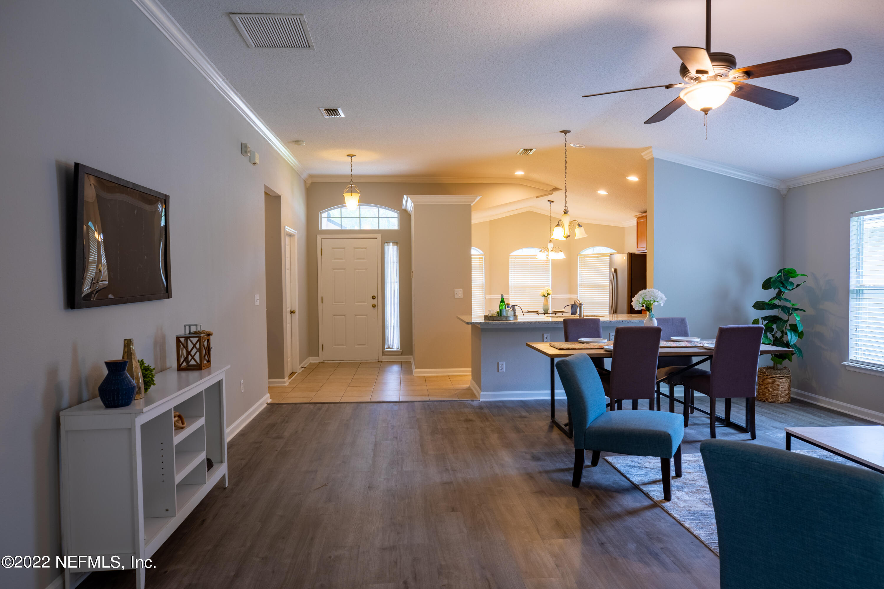 2067 North Cranbrook Avenue St. Augustine, FL 32092 - Photo 8 of 26 a view of a dining room with furniture window and wooden floor