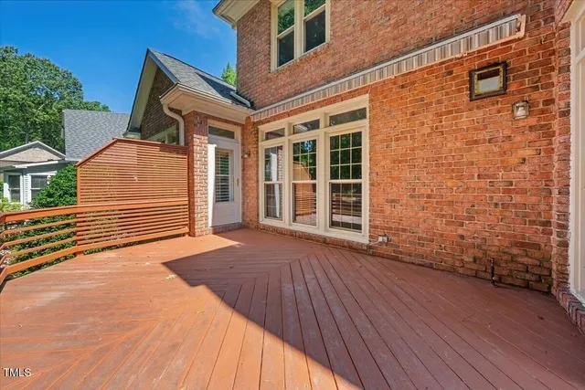 a view of an empty room with a fireplace