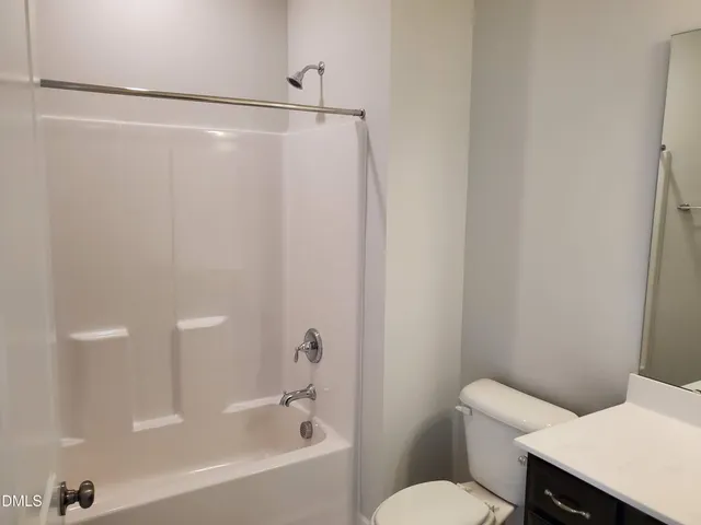 a view of a room with an empty space