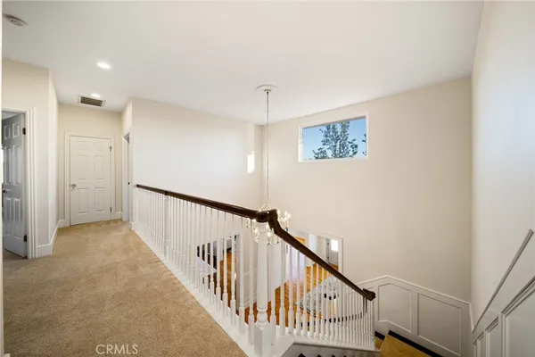 a view of hallway with stairs
