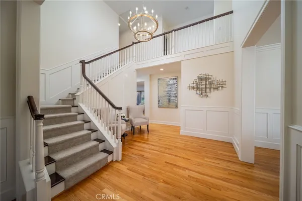 a view of entryway with wooden floor