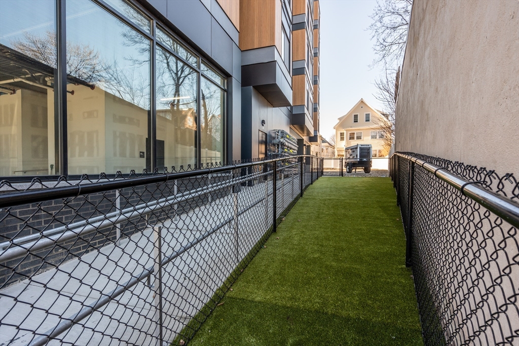600 Broadway, Unit 203 Chelsea, MA 02150 - Photo 25 of 28 a view of a pathway of a building from a window