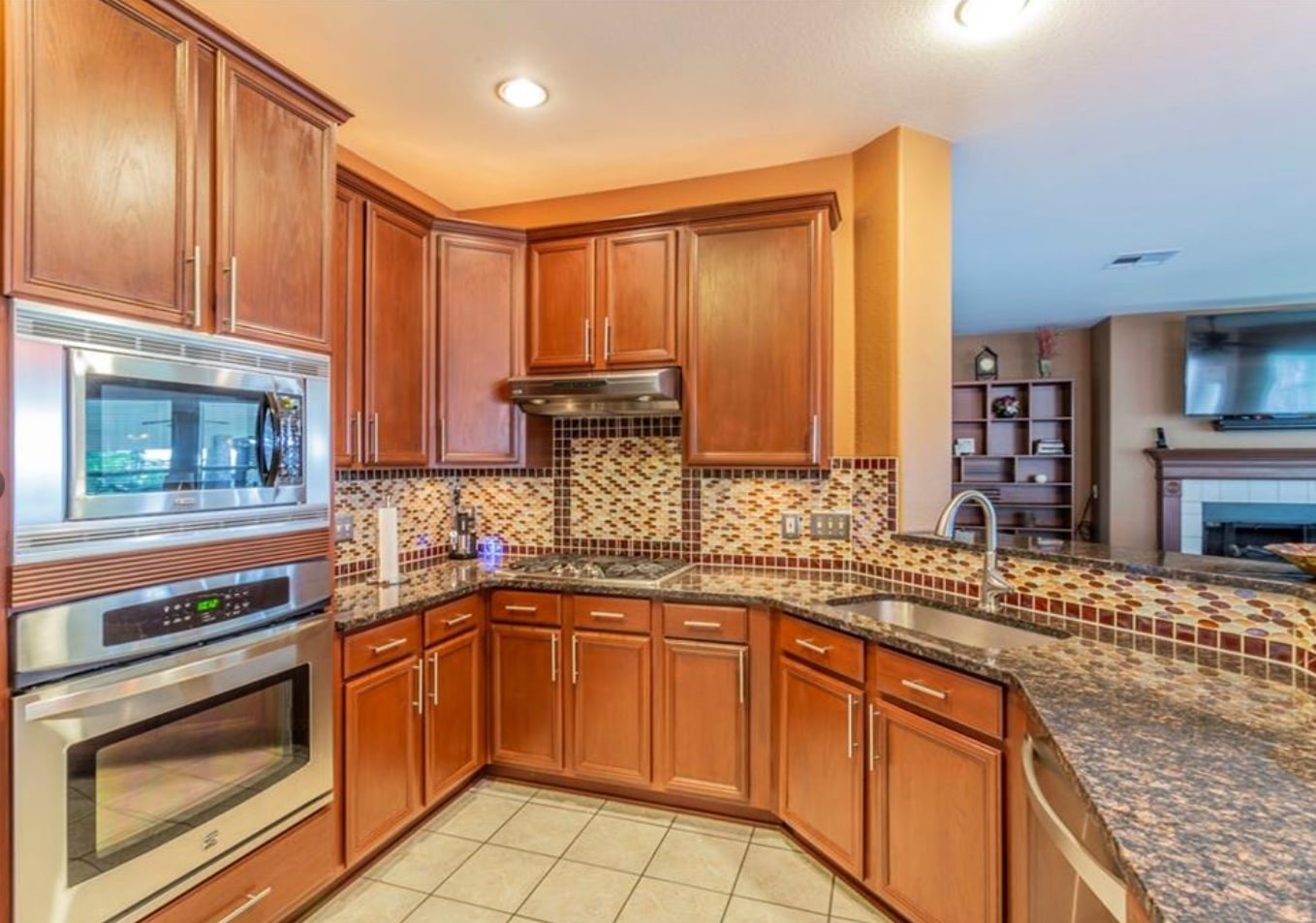 1100 Antelope Ridge Cedar Park, TX 78613 - Photo 6 of 24 a kitchen with a sink stove and microwave