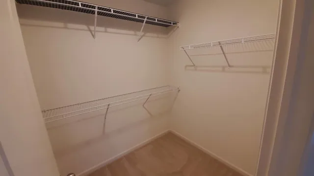 a view of a room with racks on the wall