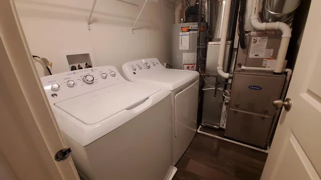 a utility room with dryer and washer