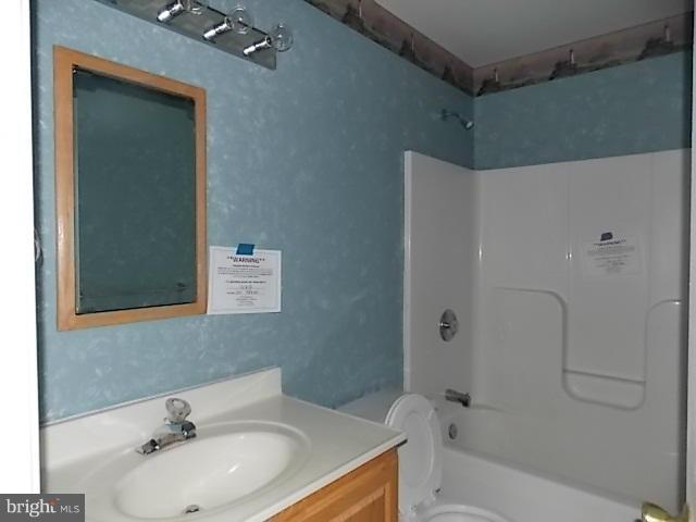 1445 Clear View Road Union Bridge, MD 21791 - Photo 22 of 30 a bathroom with a sink a toilet and shower
