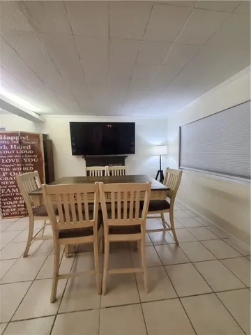 a workspace with furniture and window