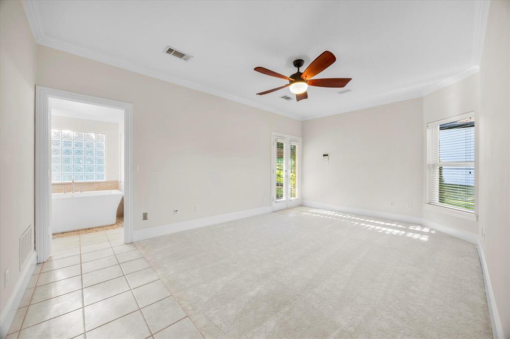 5411 Ranger Drive Rockwall, TX 75032 - Photo 11 of 25 a view of an empty room with a window