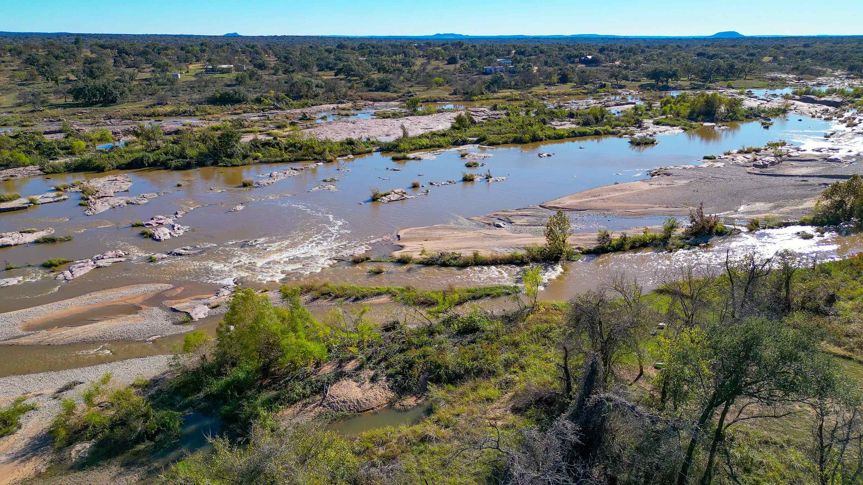 104 County Road 104 Road Llano, TX 78643 - Photo 4 of 13 a view of a lake with green space
