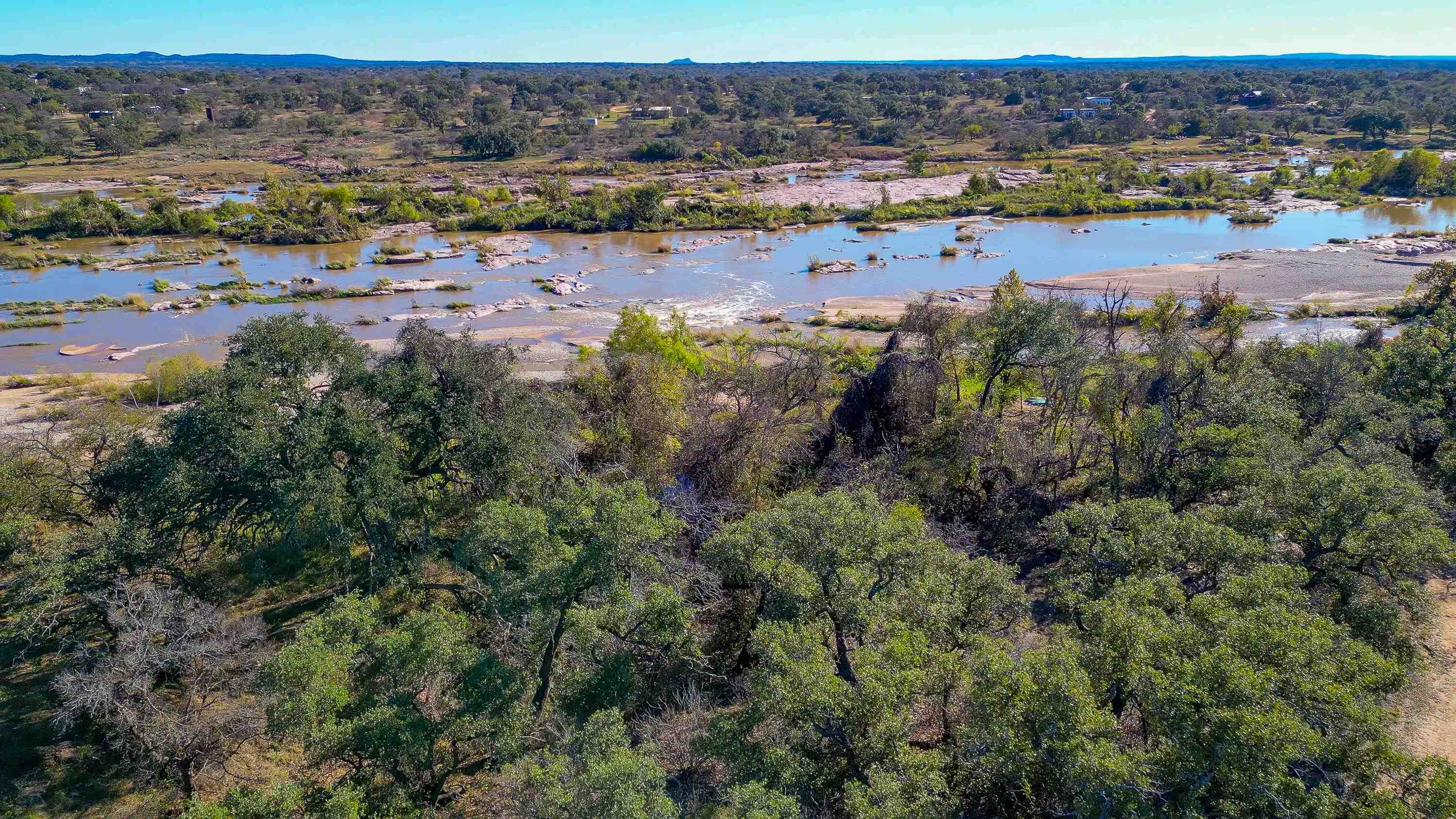 104 County Road 104 Road Llano, TX 78643 - Photo 5 of 13 an aerial view of ocean and trees all around