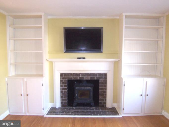 442 Range Road Towson, MD 21204 - Photo 1 of 22 Cozy Fireplace with Insert & Built-in Bookshelves