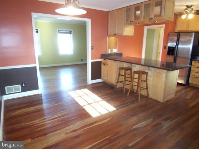 442 Range Road Towson, MD 21204 - Photo 2 of 22 Open Dining Room with Gorgeous Wood Floors