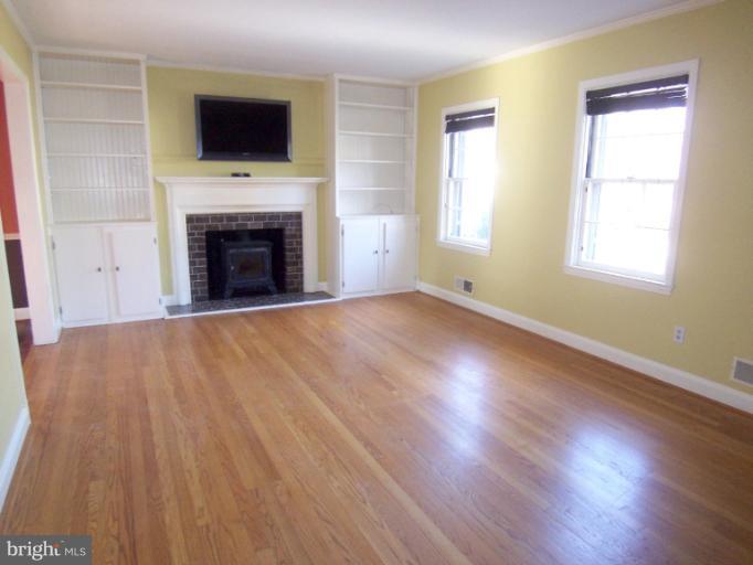 442 Range Road Towson, MD 21204 - Photo 7 of 22 Sun-Filled Living Room with Gleaming Wood Floors
