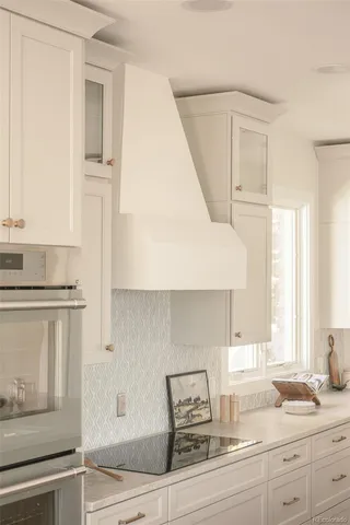 a dining room with wooden floor and breakfast area