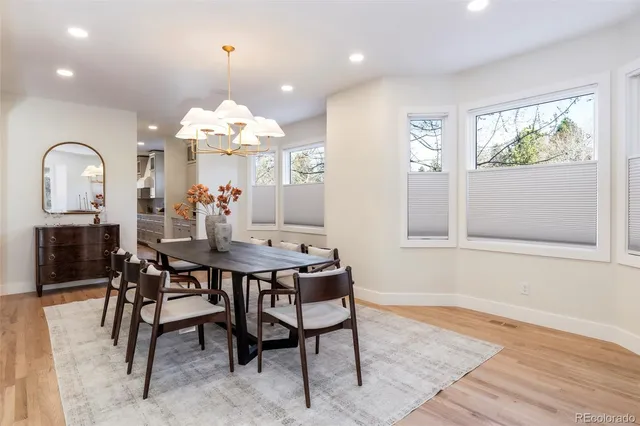 a bed room with a bed and a large window