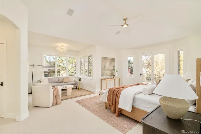 a kitchen with stainless steel appliances kitchen island a cabinets and a rug