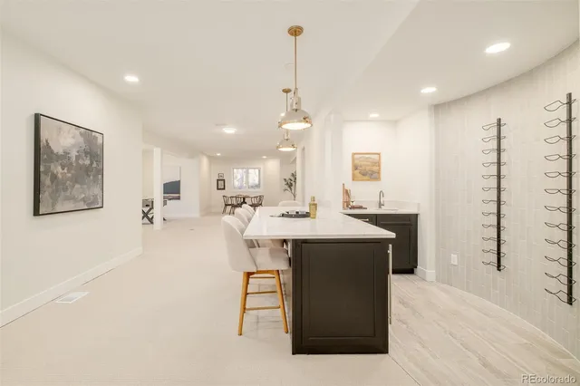 a living room with fireplace furniture and a flat screen tv