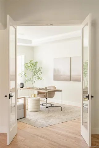 a kitchen with a table and chairs in it