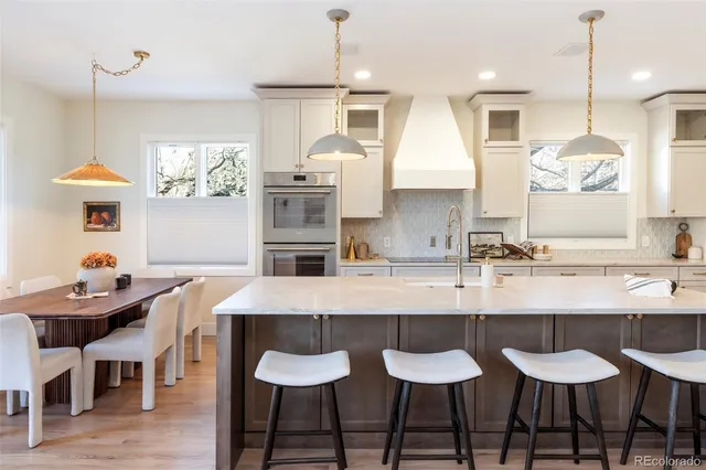 a work room with furniture and a window