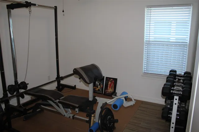 a bed room with a bed and a window