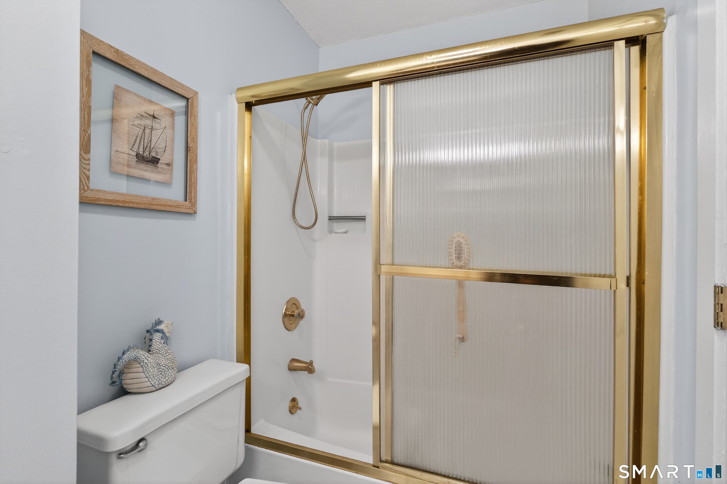 9 Upper Commons, Unit 9 Woodbury, CT 06798 - Photo 22 of 38 a bathroom with a shower and a sink