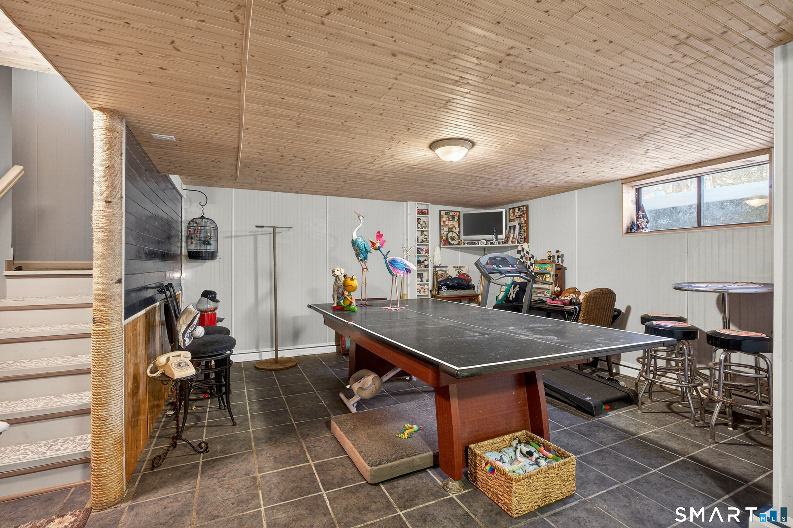 9 Upper Commons, Unit 9 Woodbury, CT 06798 - Photo 27 of 38 a room with furniture and gym equipment