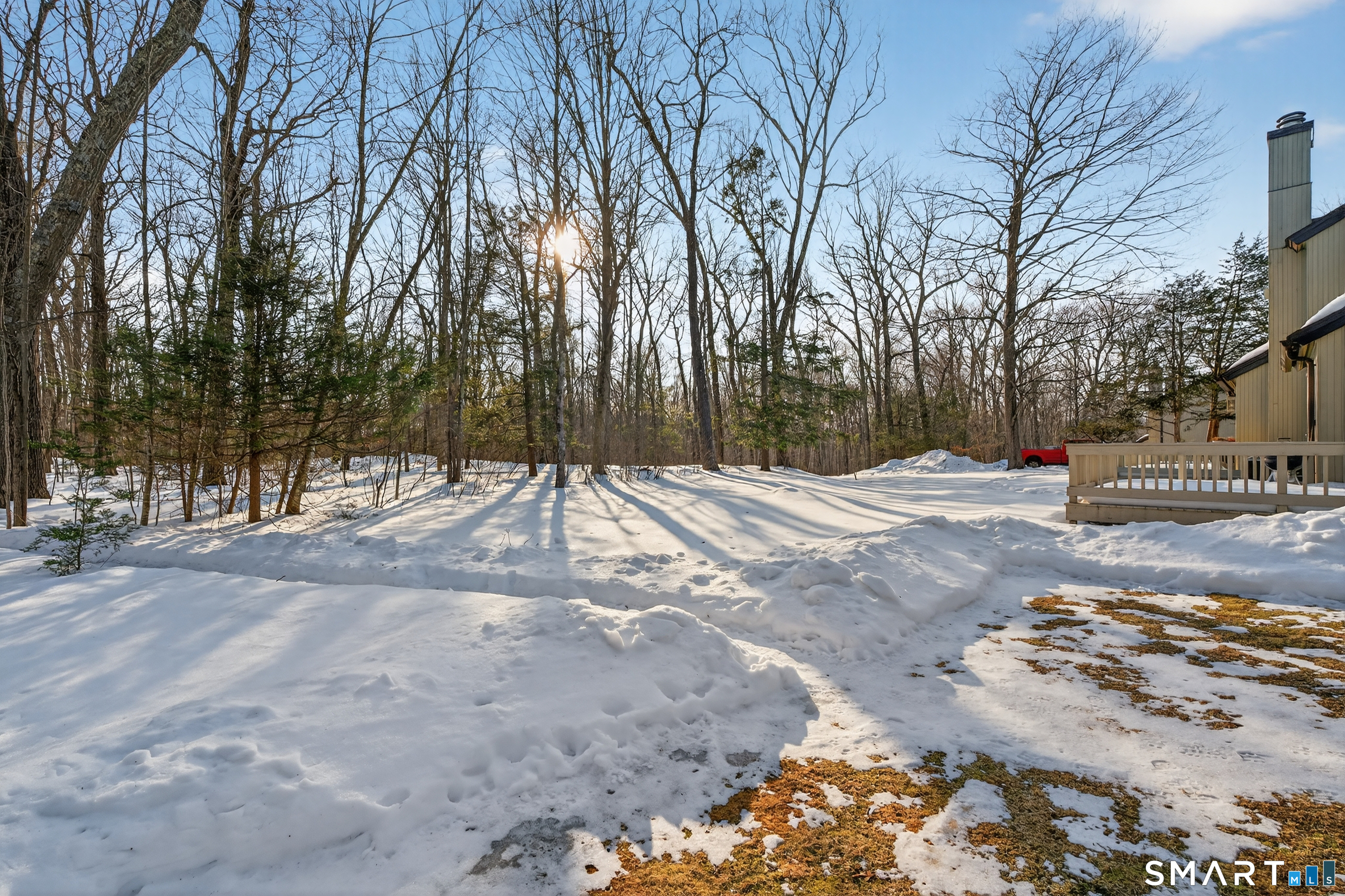 9 Upper Commons, Unit 9 Woodbury, CT 06798 - Photo 33 of 38 a view of road with trees