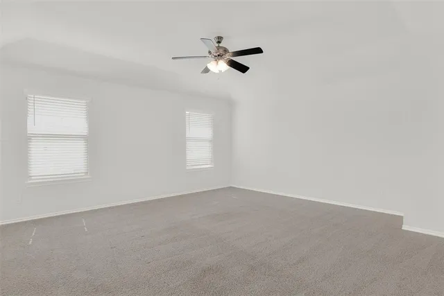 a view of a room with a fan