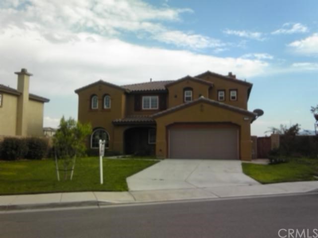 16169 Blacksage Court Riverside, CA 92503 - Photo 1 of 1 a front view of a house with a yard and garage
