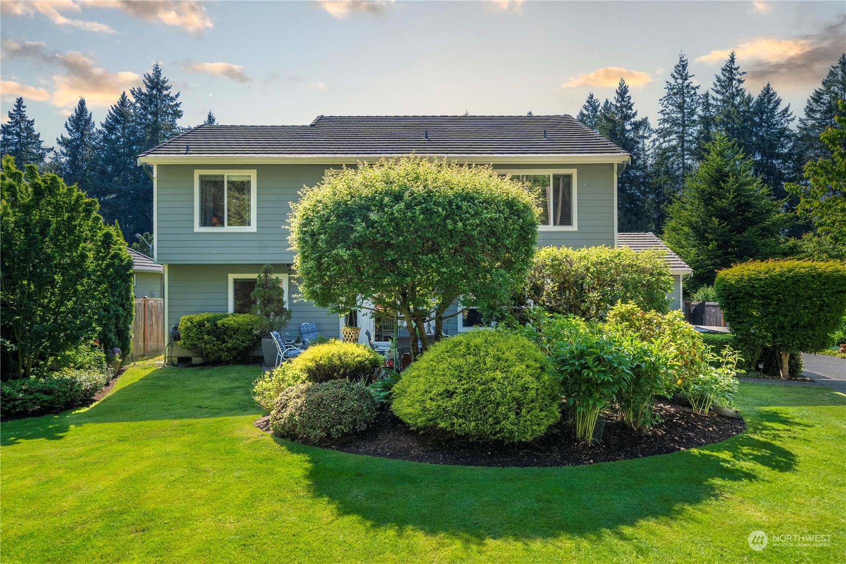 17811 87th Avenue East Puyallup, WA 98375 - Photo 29 of 37 a front view of a house with garden