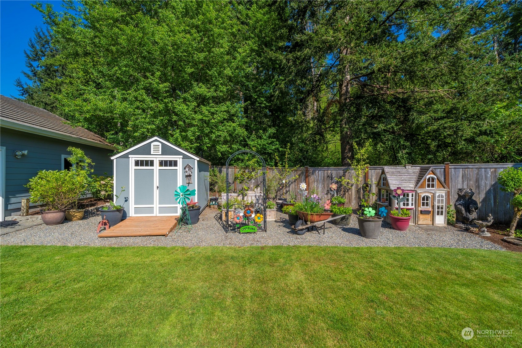17811 87th Avenue East Puyallup, WA 98375 - Photo 31 of 37 a front view of a house with garden