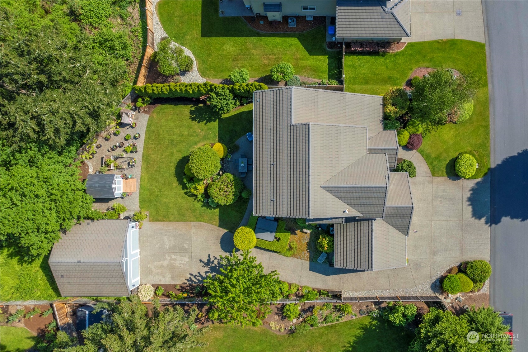 17811 87th Avenue East Puyallup, WA 98375 - Photo 34 of 37 an aerial view of a house with swimming pool