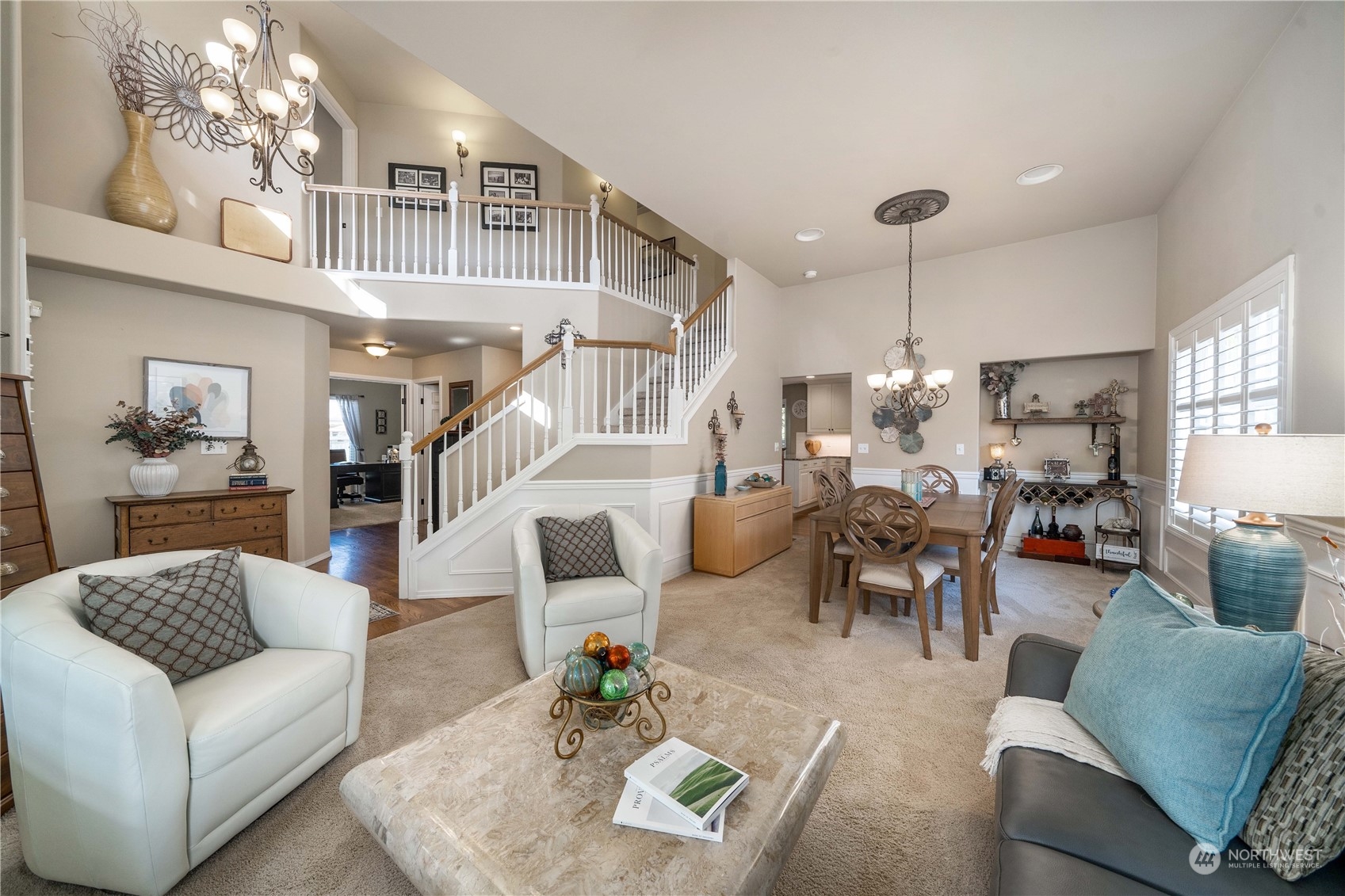 17811 87th Avenue East Puyallup, WA 98375 - Photo 7 of 37 a living room with furniture chandelier and a chandelier