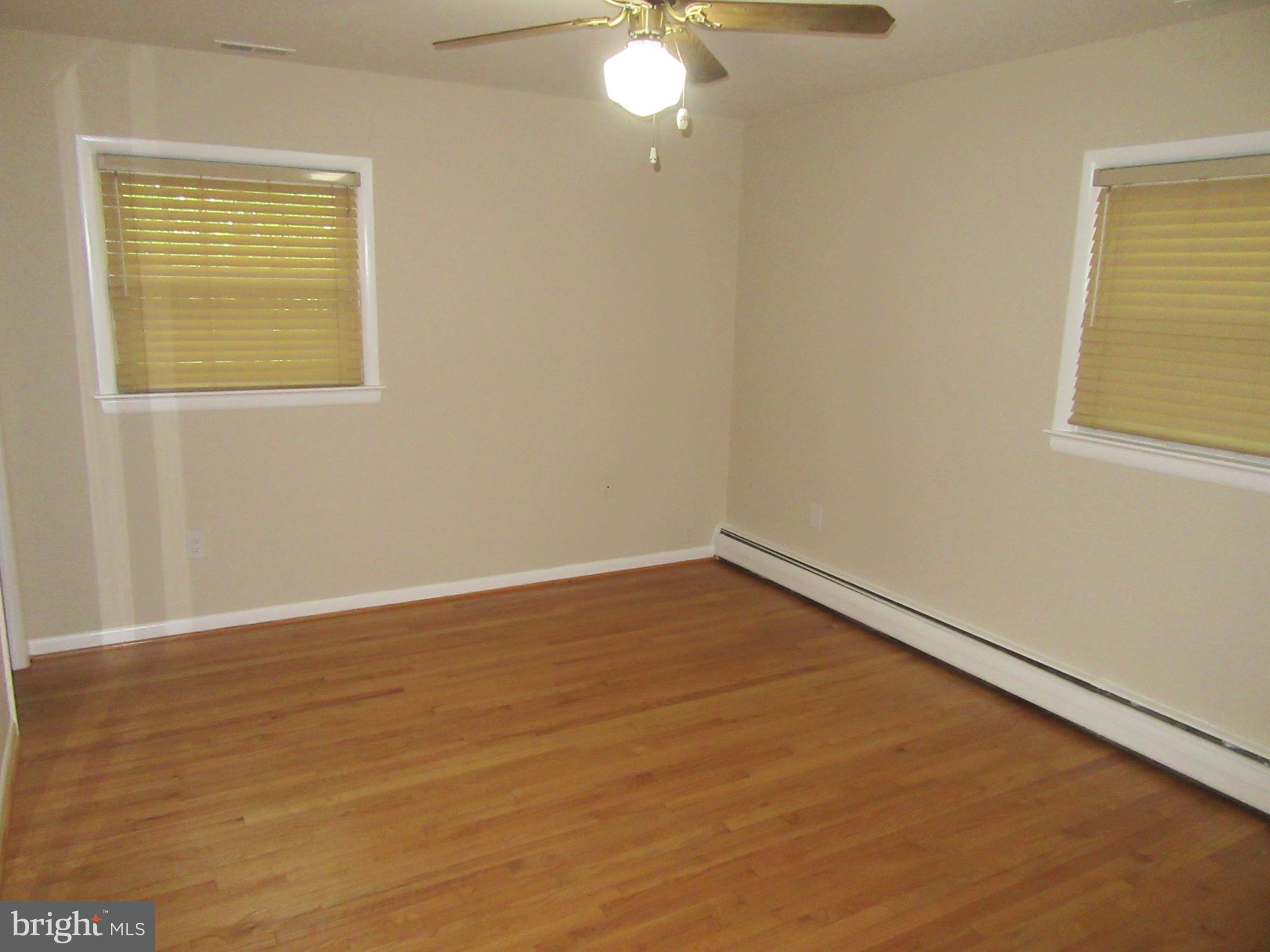 3903 Harrison Road Beltsville, MD 20705 - Photo 22 of 55 Master Bedroom with Newly Finished Hardwood floors
