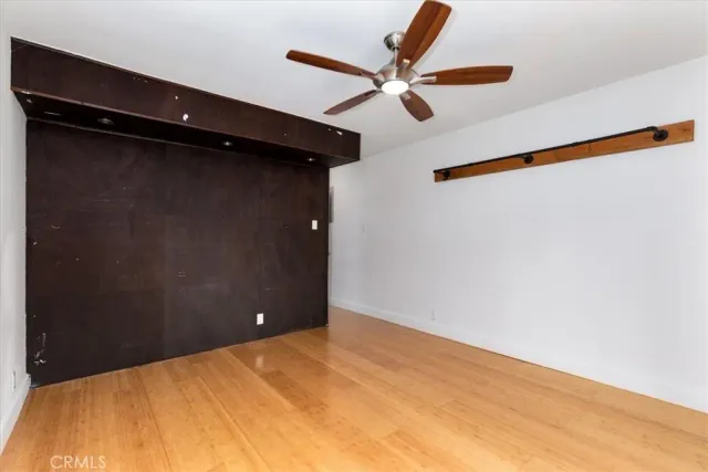 a view of a hallway with washer and dryer