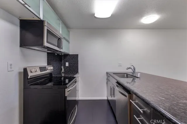 $430,000 | 7890 East Spring Street, Unit 18F, Long Beach, CA 90802