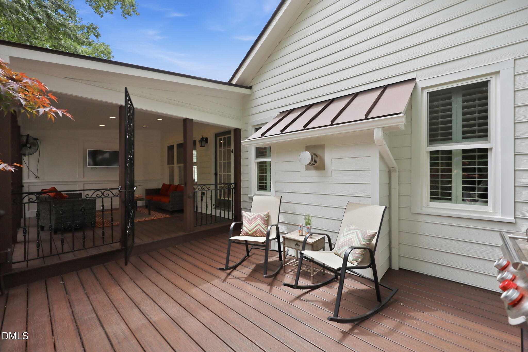 1716 Farmington Grove Drive Raleigh, NC 27614 - Photo 31 of 41 a view of a patio with table and chairs with wooden floor and fence