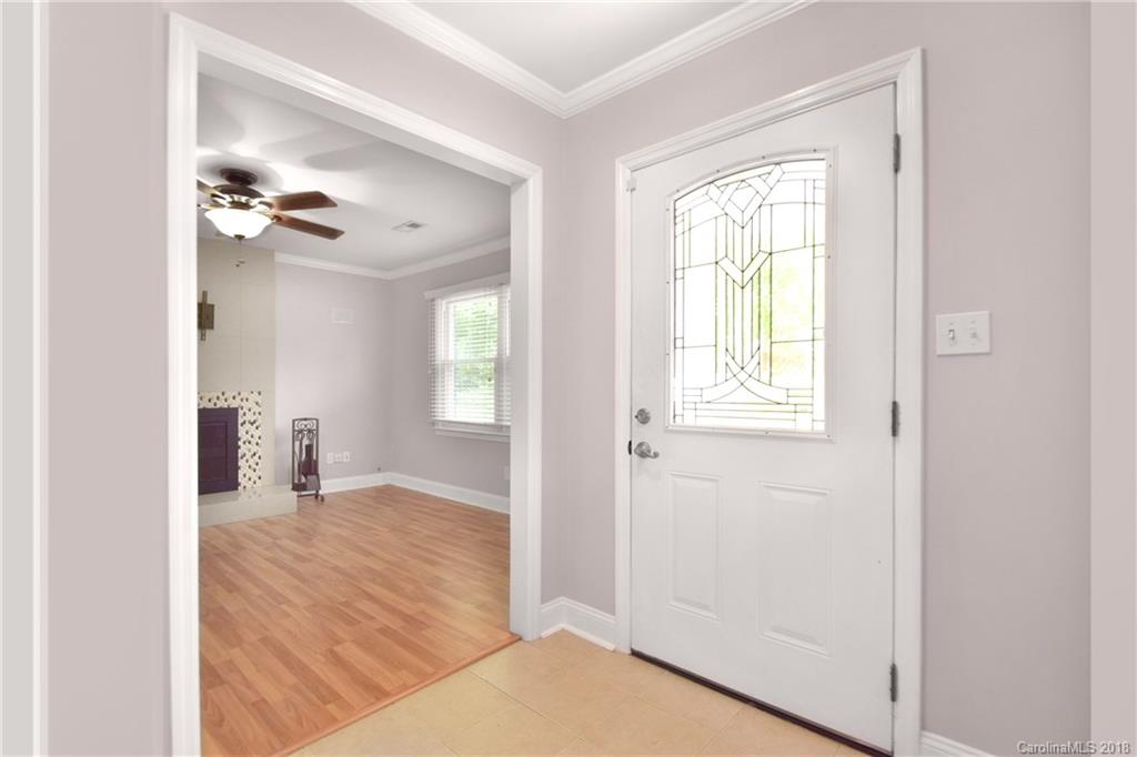 6426 Round Hill Road Charlotte, NC 28211 - Photo 3 of 23 an empty room with closet and a window