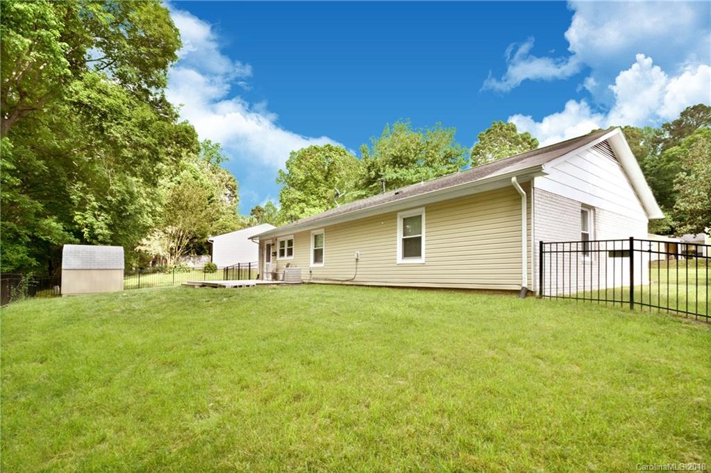 6426 Round Hill Road Charlotte, NC 28211 - Photo 21 of 23 a house view with a garden space