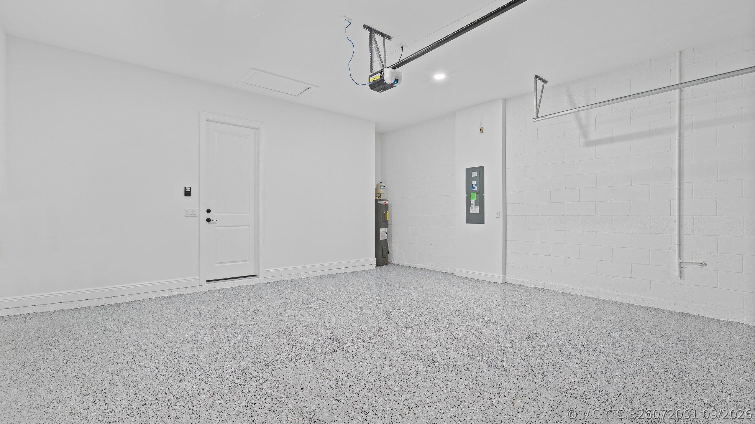 7999 Southwest Andrea Way Port St. Lucie, FL 34987 - Photo 28 of 64 Garage