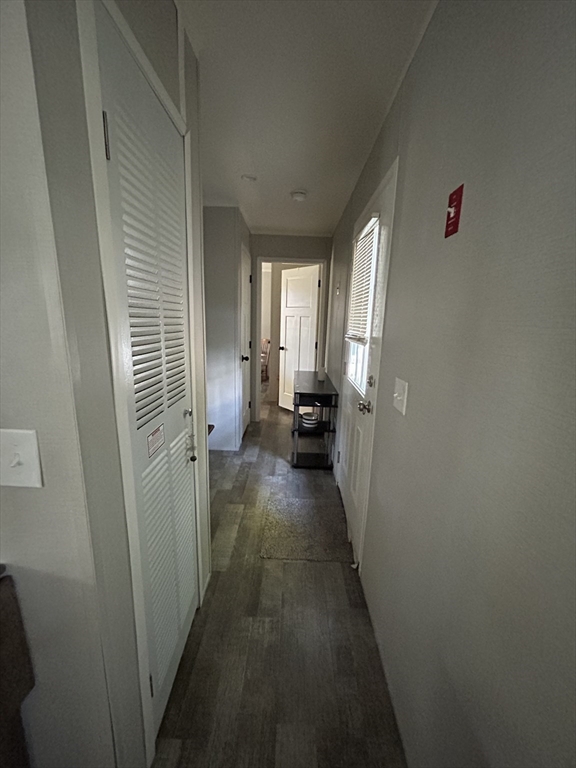 41 Longboat Road Wareham, MA 02576 - Photo 3 of 15 a view of a hallway with a livingroom