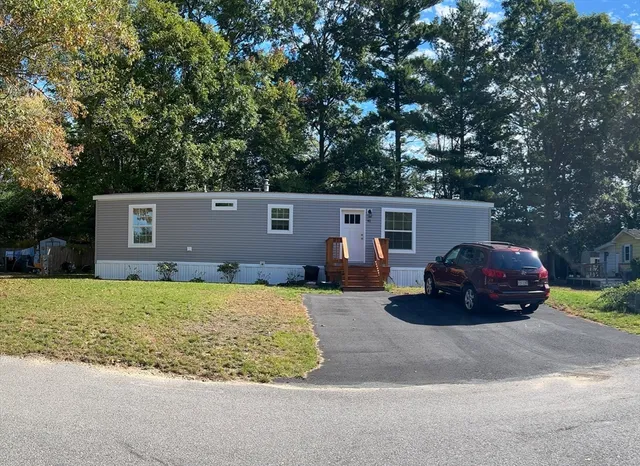 front view of a house with a patio