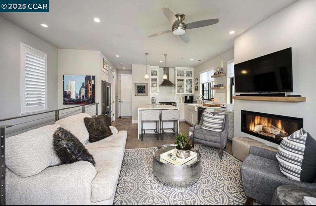 Undisclosed Address Alamo, CA 94507 - Photo 2 of 8 a living room with furniture and a fireplace
