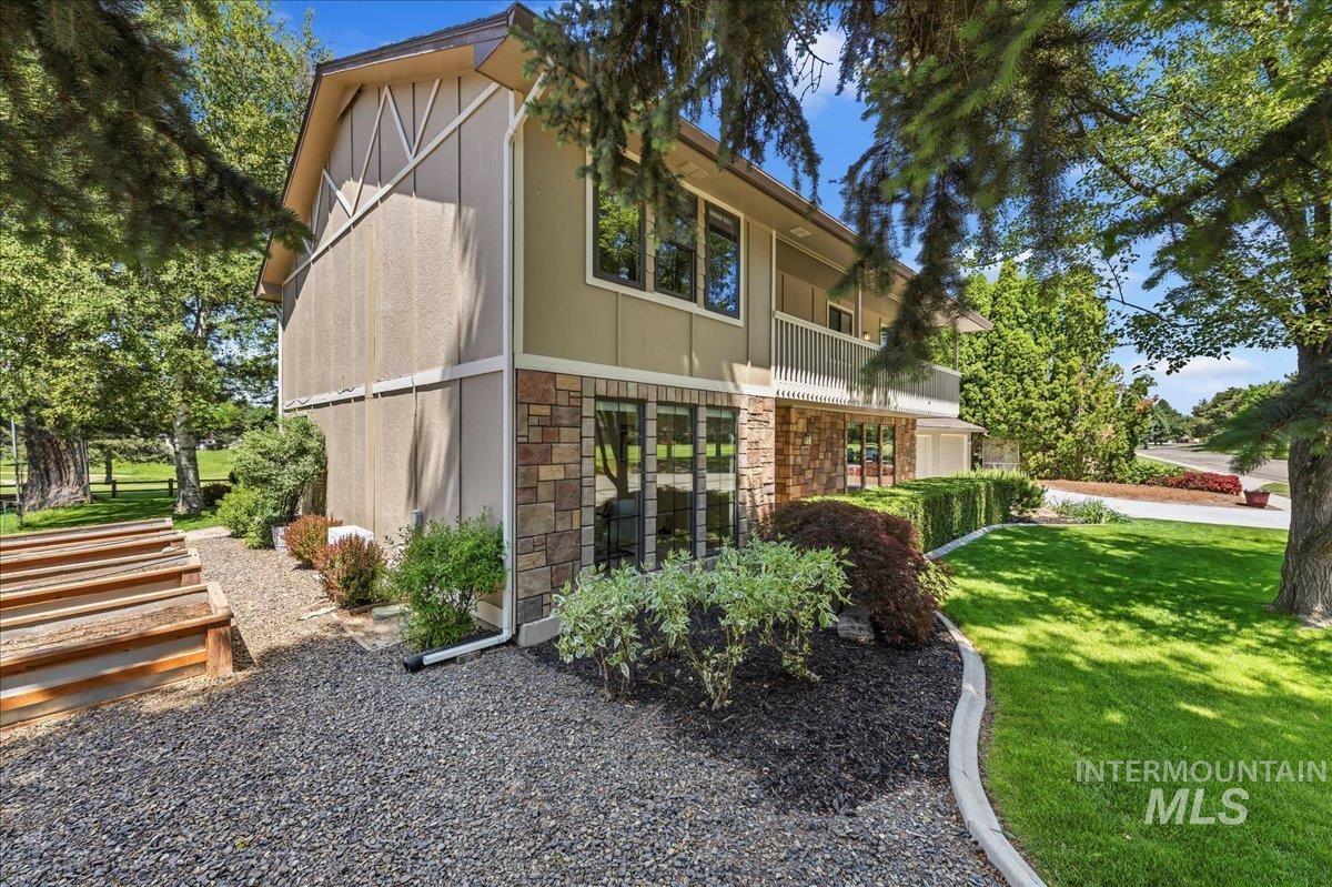 599 Pebble Beach Way Eagle, ID 83616 - Photo 4 of 44 Multi-level exterior featuring stone veneer, stucco, and wood siding