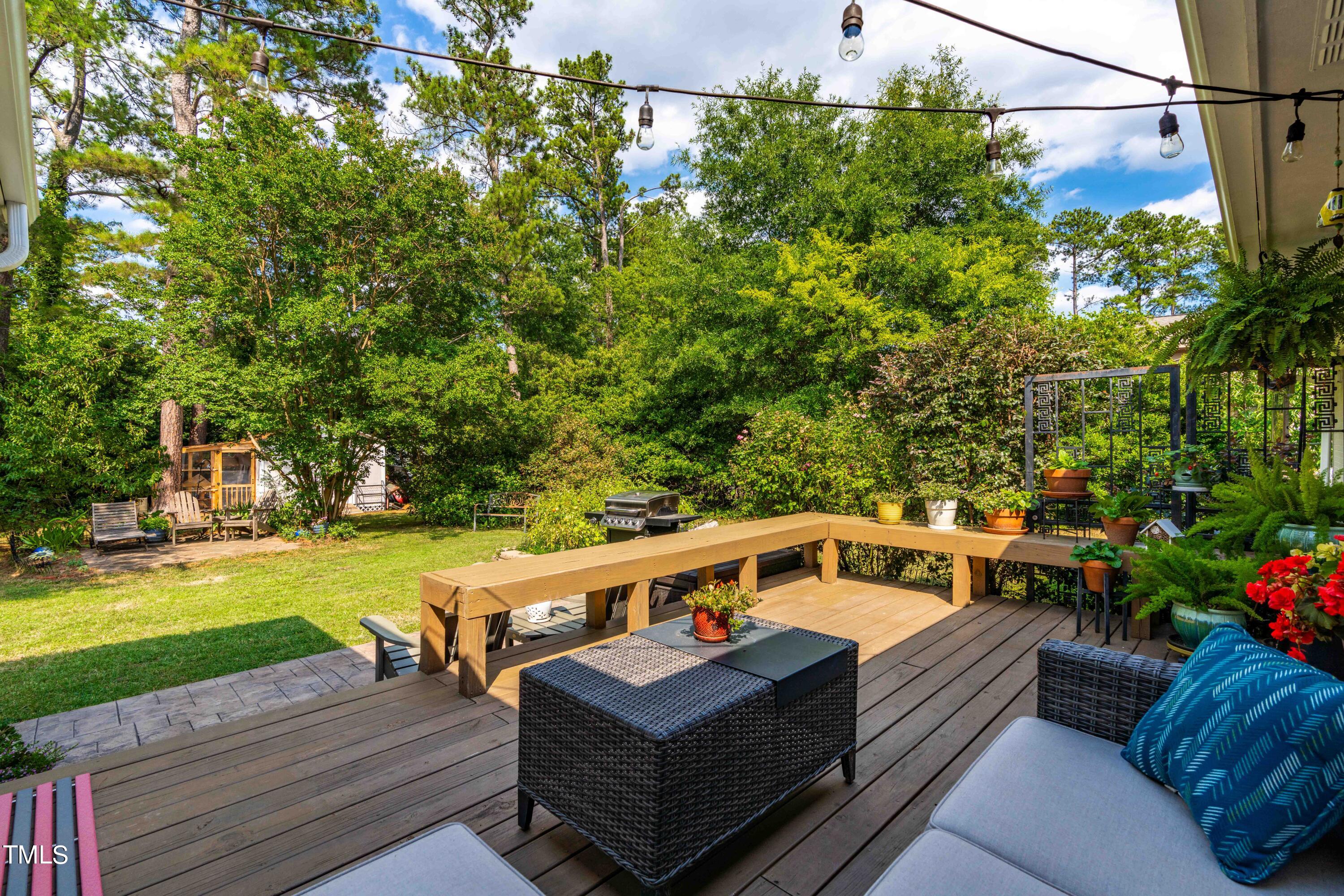 2613 Glascock Street Raleigh, NC 27610 - Photo 23 of 31 Deck looks over the fully fenced back yard.