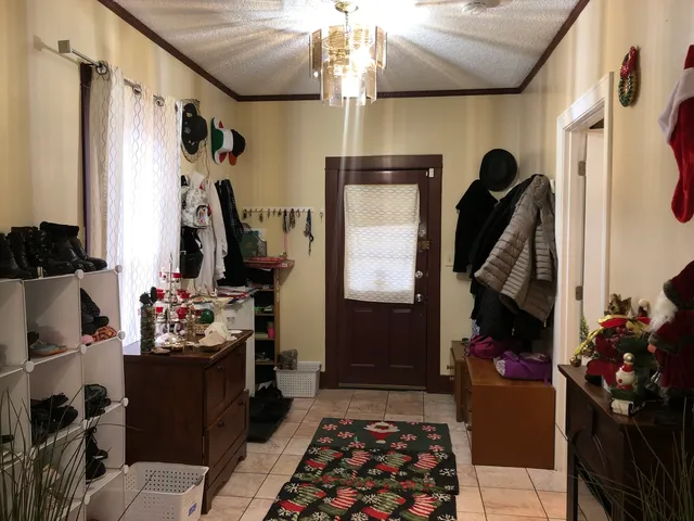 a kitchen with stainless steel appliances granite countertop a refrigerator and a stove
