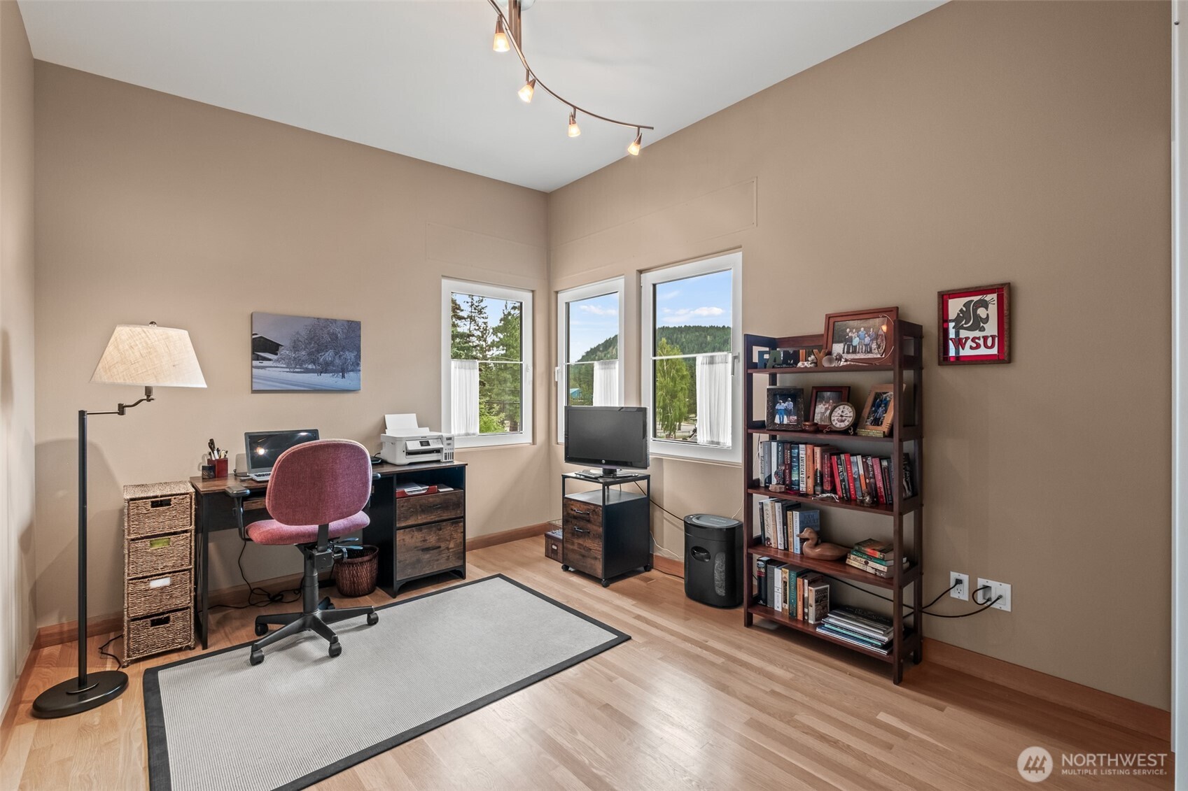 10202 Titus Road Leavenworth, WA 98826 - Photo 32 of 39 a view of a workspace with furniture and a window