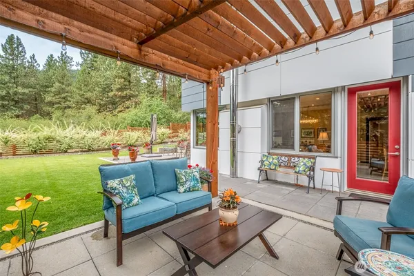a outdoor living space with furniture and garden view